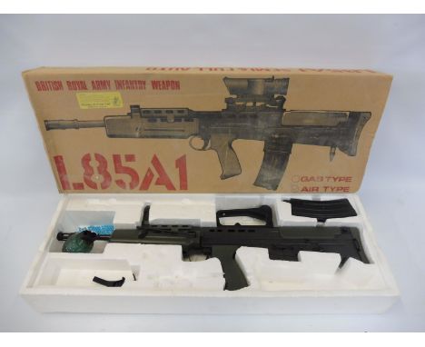 A boxed Webley British Royal Army Infantry air rifle. 