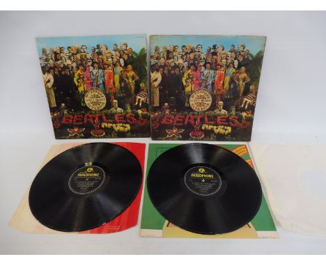 Two Beatles Sgt. Pepper LPs, one first press plus insert, visible flaps on the gatefold sleeve, red and white inner, VG+ cond