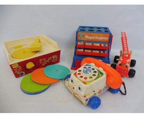 A selection of Fisher Price including a fire engine and a record player, complete. 