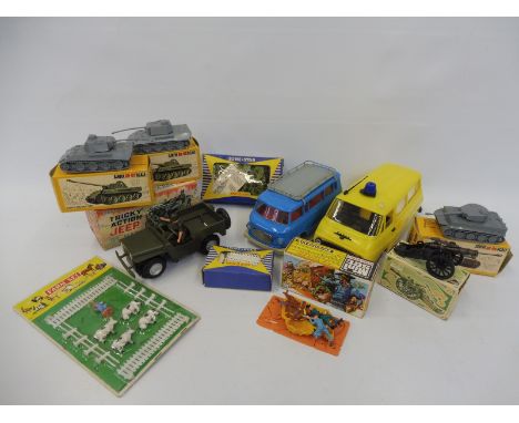 A selection of plastic toys to include a Marx Jeep, Airfix tanks, Lone Star accessories, also unusual Italian plastic.