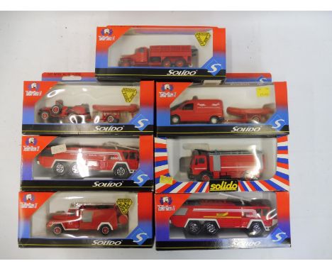 Seven boxed Solido die-cast models, all emergency vehicles and fire engines.