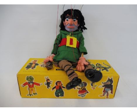 A boxed Pelham puppet 'Giant', original box and instructions, still retaining the often missing  club, nicely dressed, with o