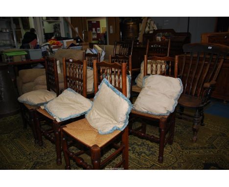 An appealing set of seven bobbin turned backed Dining Chairs in mixed woods and including five dining and a pair of carver Ch