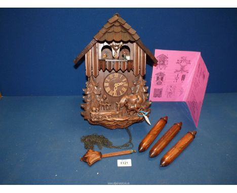 A carved Cuckoo clock, Innsbruck, Austria.