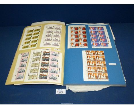 A Scrap book of many mint sheets of Stamps dated 1975-1976, together with First Day covers 1988, 1989 and 1976.