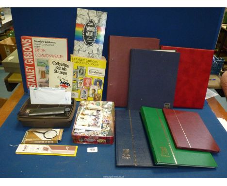 A box of Philatelic ephemera:  Stanley Gibbons 1981 stamp catalogue specialised Elizabethan Commonwealth stamp, SG 1994 stamp