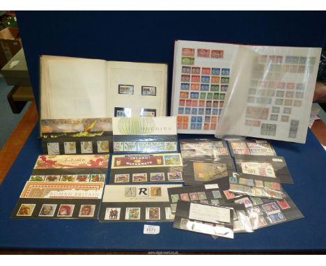A Red Stock book with GB stamps including QV and revenues, stamp album with GB and Commonwealth mint stamps, stock cards with