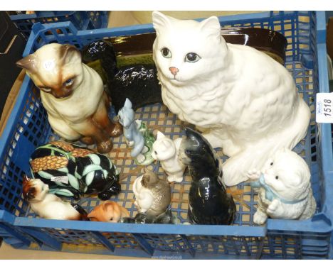 A quantity of cat ornaments including Beswick, Royal Doulton, Wade 'Tom &amp; Jerry', Country Artists 'Inspiration',Royal Wor