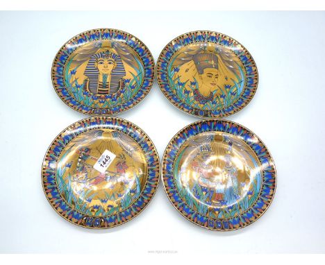 Four Royal Worcester Legend of the Nile porcelain plates;  Mask of Tutankhamun, Nefertiti, Tutankhamun at hunt and Tutankhamu