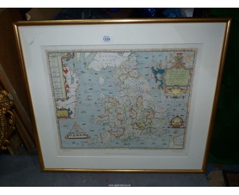 A framed print of a Saxton's Map of England and Wales 1579.