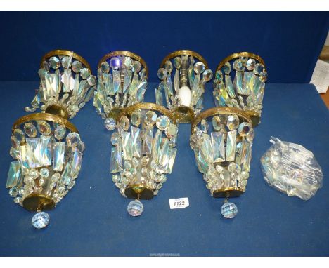 Seven 20th century crystal and brass drop Lustre light fittings, all complete plus extras.