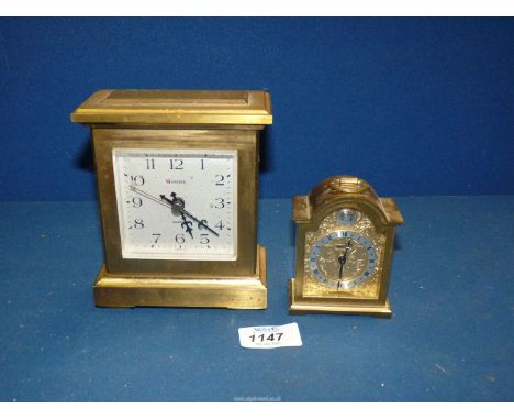 A very heavy brass "Europa" quartz Carriage clock and a smaller one by "Swiza" marked "Tempus Fugit"