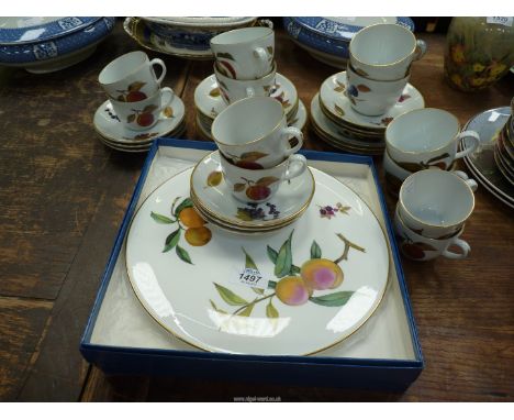 A quantity of Royal Worcester 'Evesham' china including six each coffee and teacups with saucers and two cake plates.