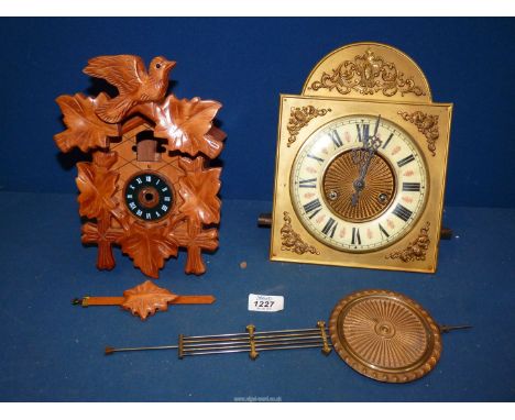 A Gustav Becker clock movement with pendulum together with a Cuckoo clock case.
