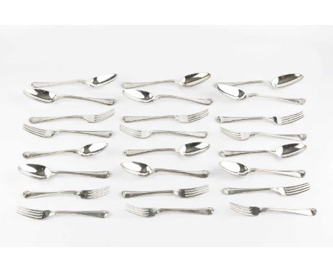 An extensive service of 19th century silver old English thread pattern flatware, comprising 24 table spoons, 49 table forks, 