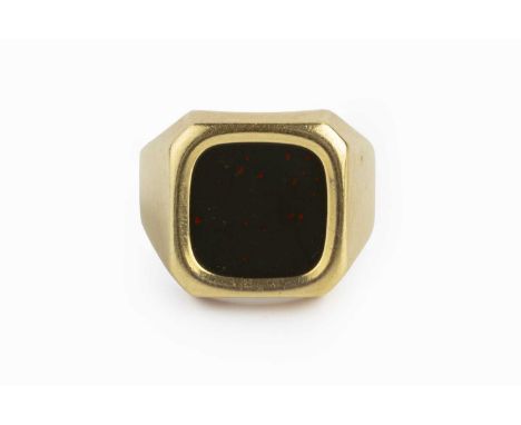A bloodstone signet ring, the cushion-shaped bloodstone panel to a tapered yellow precious metal mount, stamped '585', ring s