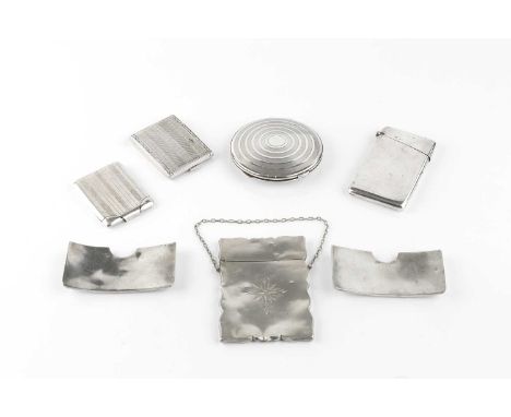 Two late Victorian silver card cases, of curved open form, both Birmingham 1899, two other silver card cases, two silver vest