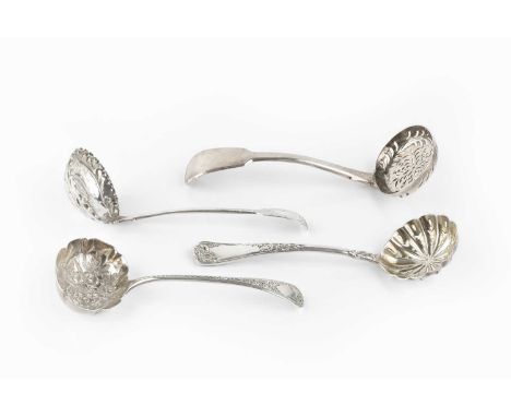 A William IV silver sifter spoon, with embossed and engraved decoration, maker W.B possibly William Bateman II, London 1831, 