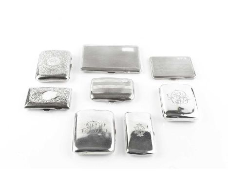 A collection of eight various silver cigarette cases, mainly early 20th century, with engine turned and engraved decoration, 
