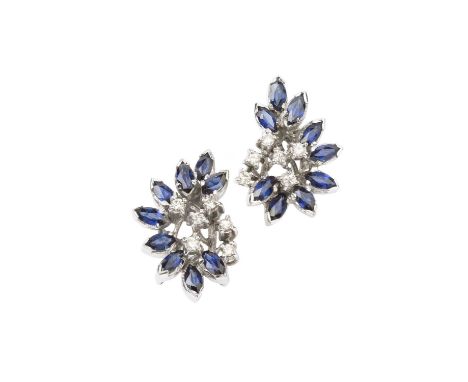 A pair of sapphire and diamond earrings, each designed as a tiered spray of navette-shaped sapphires and round brilliant-cut 