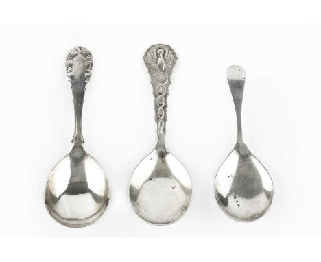 A Danish silver caddy spoon, with stylised flowerhead decoration to the handle, by Georg Jensen, import marks for London 1923