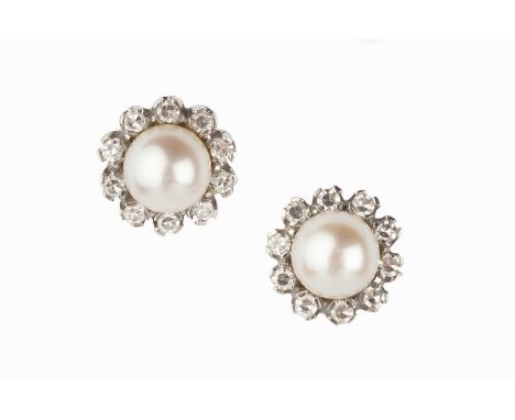 A pair of cultured pearl and diamond cluster ear studs, each with a cultured pearl measuring approximately 6.5mm in diameter,