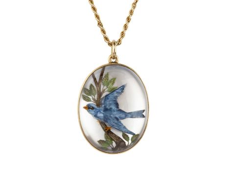A late 19th/early 20th century reverse carved intaglio pendant, the oval cabochon reverse carved and painted to depict a bird