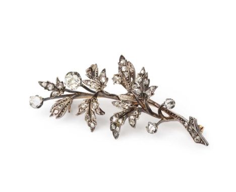 A late 19th/early 20th century diamond spray brooch, designed as a spray of graduated old, rose and lasque-cut diamond set fo
