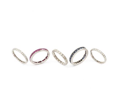 A collection of full hoop eternity rings, comprising a diamond full hoop ring, set throughout with single-cut diamonds, stamp