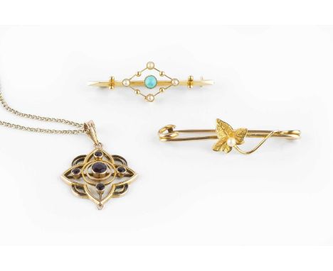 A small collection of jewellery, comprising a stone set pendant, stamped '9CT', (drop deficient), suspended from a fine curb-