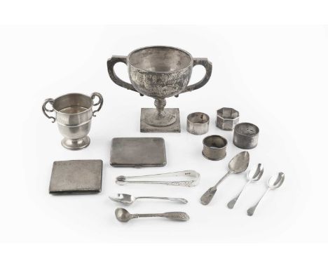 A collection of silver, comprising a twin handled trophy cup, another, smaller trophy cup, two cigarette cases, four napkin r