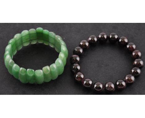 A Chinese garnet bead bracelet together with a jade bracelet