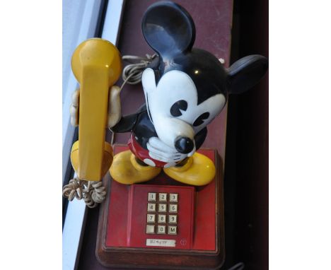 A vintage British Telecom domestic telephone modelled in the form of Mickey Mouse, H. 40cm