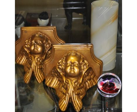 A cylindrical onyx vase, H. 20cm, together with a vintage glass paperweight, and a pair of wall brackets, modelled as cherubs