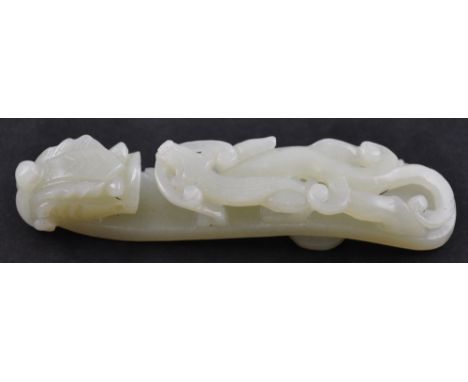 A Chinese jade belt hook in the form of a dragon