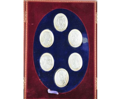 A set of 6 silver portrait medallions of The Royal Family, set in blue easel frame and outer case, hallmarked London 1972