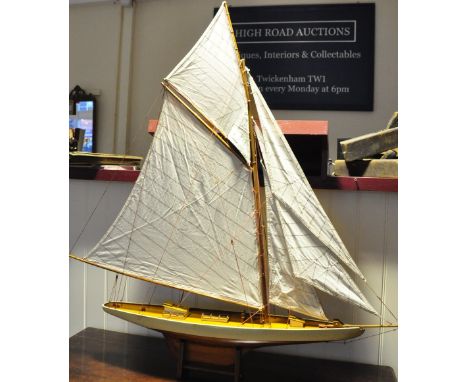 A vintage style model pond yacht, with cream canvas sails, h:124cm