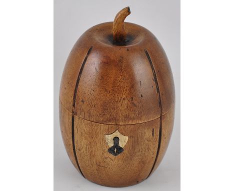 A Georgian style turned fruitwood melon shaped tea caddy and key