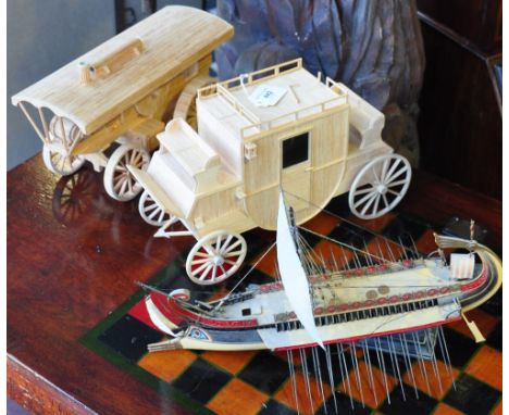 Two scratch-built matchstick models: a stagecoach, H. 20cm and a steam engine, together with a scale model of a Roman galleon