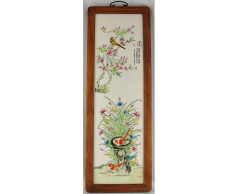 A ceramic Chinese wall hanging plaque