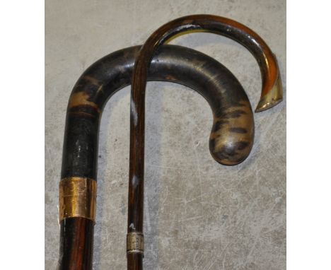 A late Victorian walking stick, with 9ct gold collar, together with another fine stick with silver mounts, (2). 