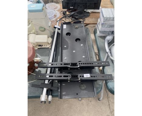 A TV WALL BRACKET AND A FURTHER TRIPOD STAND 