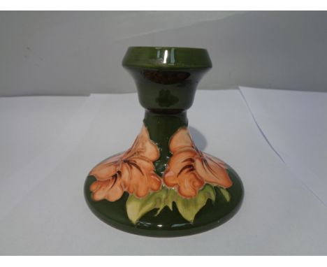 A MOORCROFT HIBISCUS CANDLE STICK 