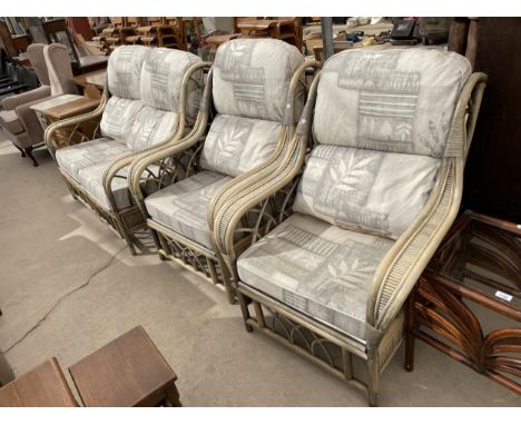 A WICKER CONSERVATORY TWO SEATER SOFA AND TWO ARMCHAIRS 