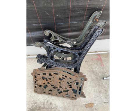 TWO PAIRS OF VINTAGE CAST IRON BENCH ENDS AND TWO CAST IRON BENCH BACK SECTIONS 