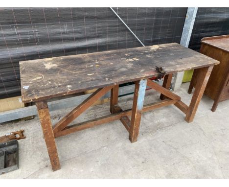 A VINTAGE BR WORKBENCH WITH A SMALL BENCH VICE 