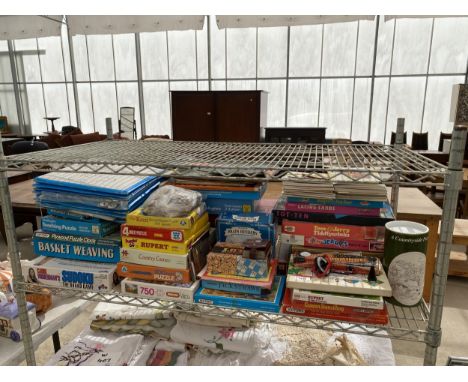 A LARGE COLLECTION OF VINTAGE AND RETRO TOYS AND GAMES 