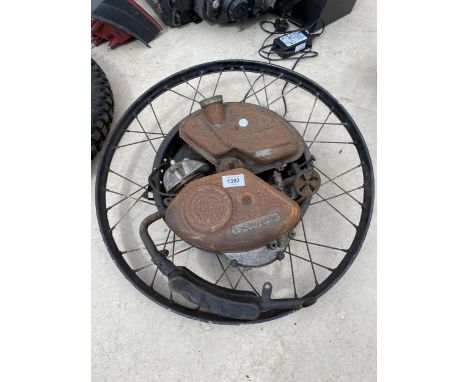 A VINTAGE CYCLEMASTER ENGINE AND WHEEL BELIEVED TO BE COMPLETE 