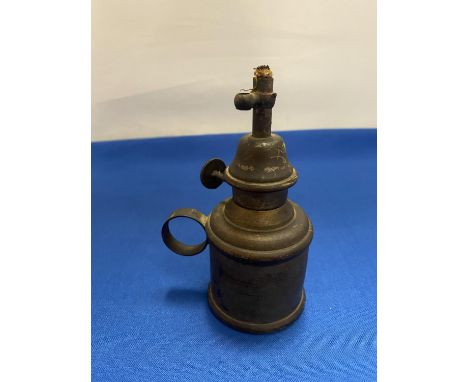 A SMALL VINTAGE PIGEON OIL LAMP 