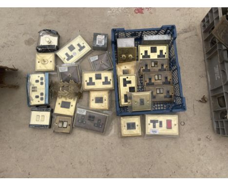 AN ASSORTMENT OF BRASS FRONTED LIGHT SWITCHES AND SOCKETS ETC 